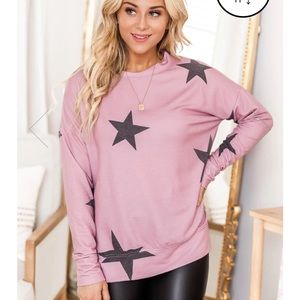 Pink Lily shirt. Brand new. Still in original package. Did not fit.